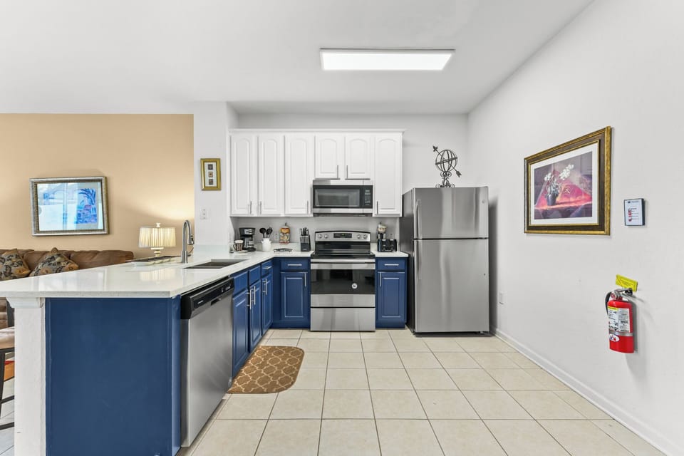 KITCHEN:  Fully Equipped Kitchen with Drip Coffee Maker, Toaster, Cookware, Dinnerware, Drinkware and Flatware.