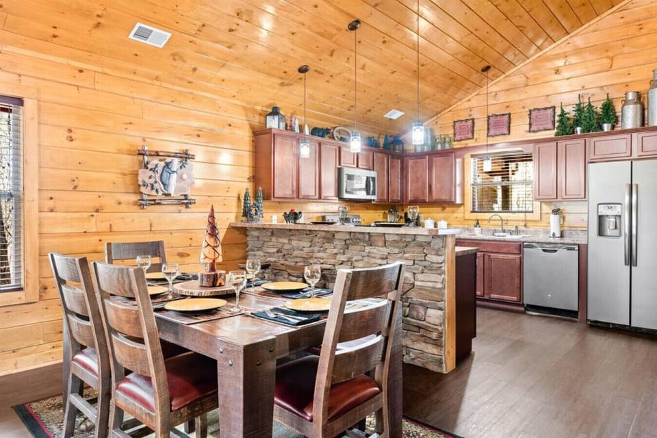 Dining Room sits 6+ at the table and 3+ at the kitchen bar. 