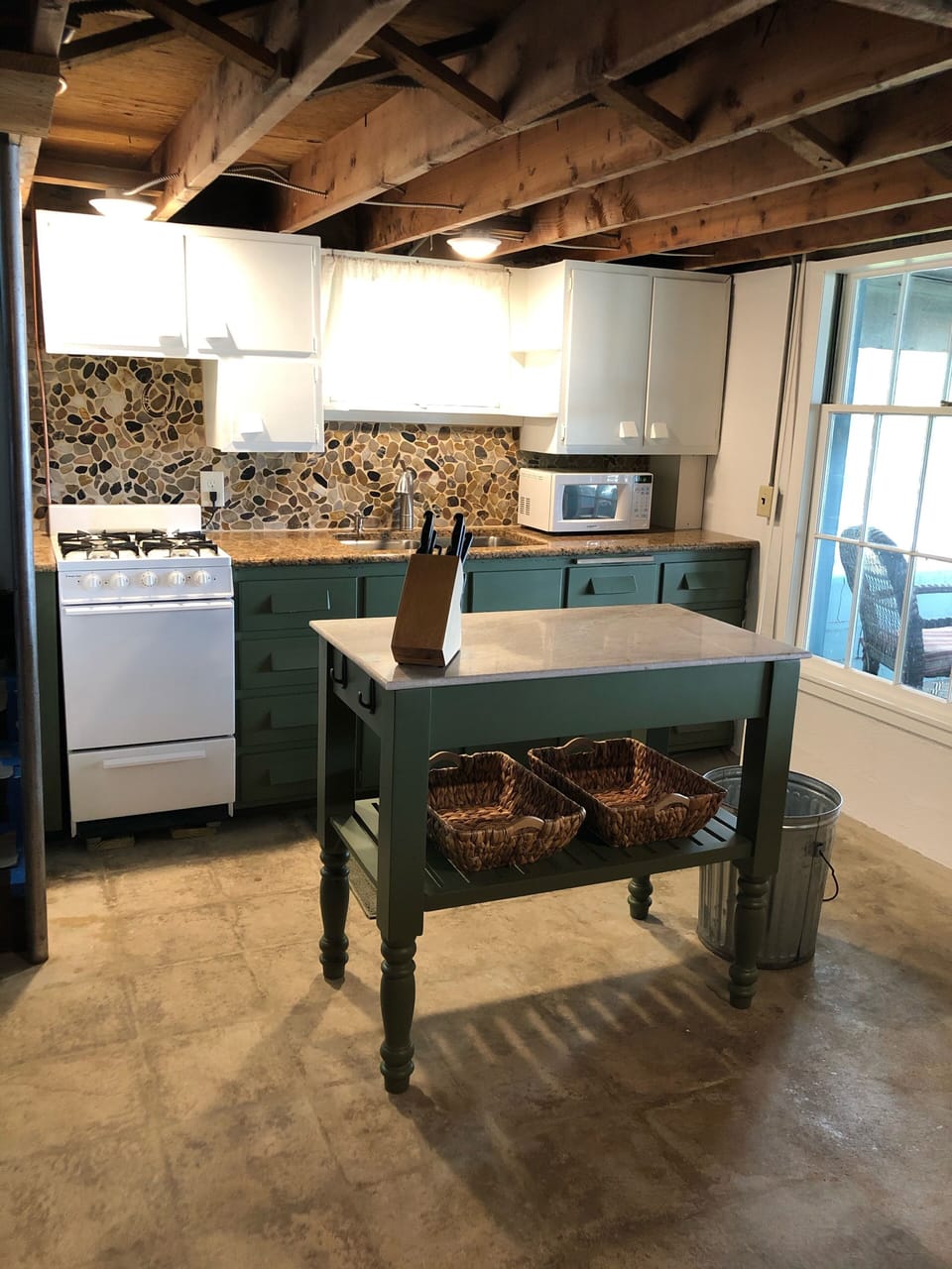 Apartment size fridge just out of view. No dishwasher. Sorry! 