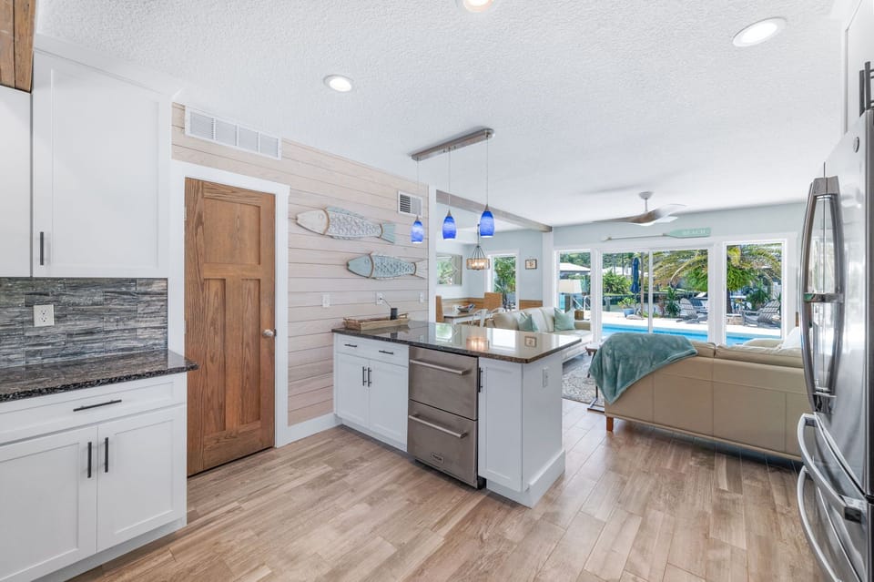 Open kitchen for conversation and view. 