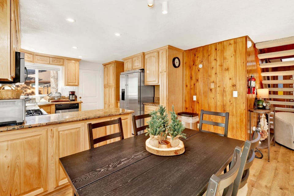 Dining area with seamless flow to living room, perfect for shared meals and relaxed conversations