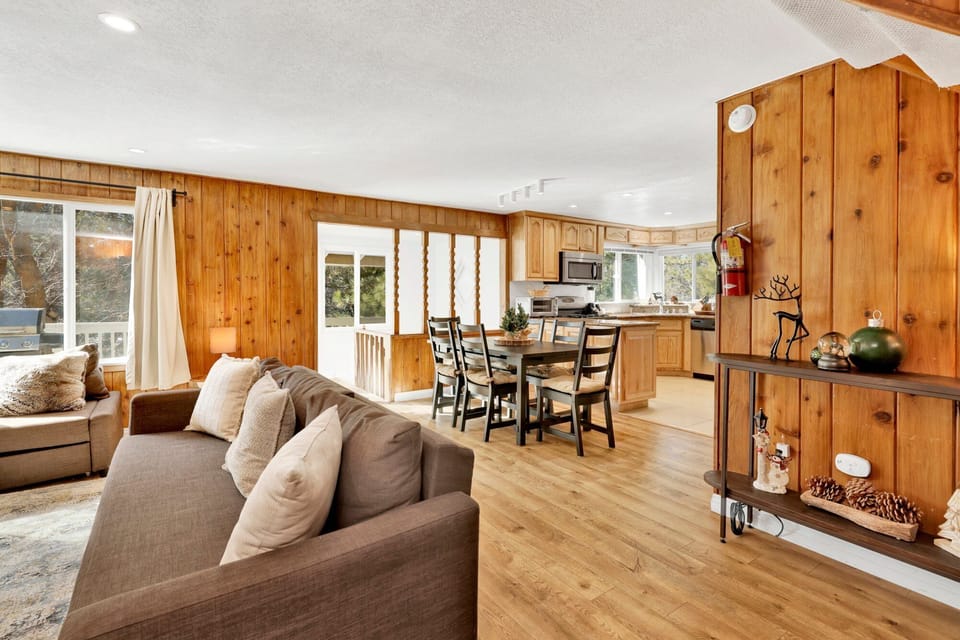 Open living room with seamless flow to dining area, perfect for shared meals and relaxed gatherings