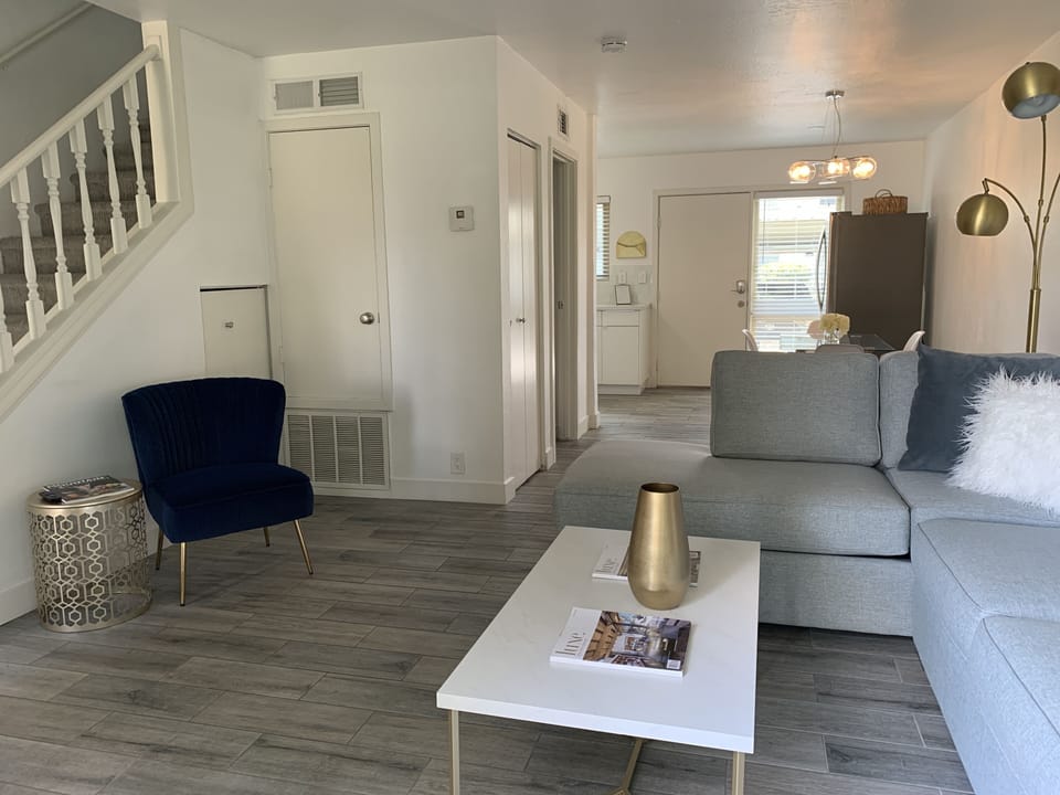 Living room leads into the dining room and kitchen. Bathroom located on the left