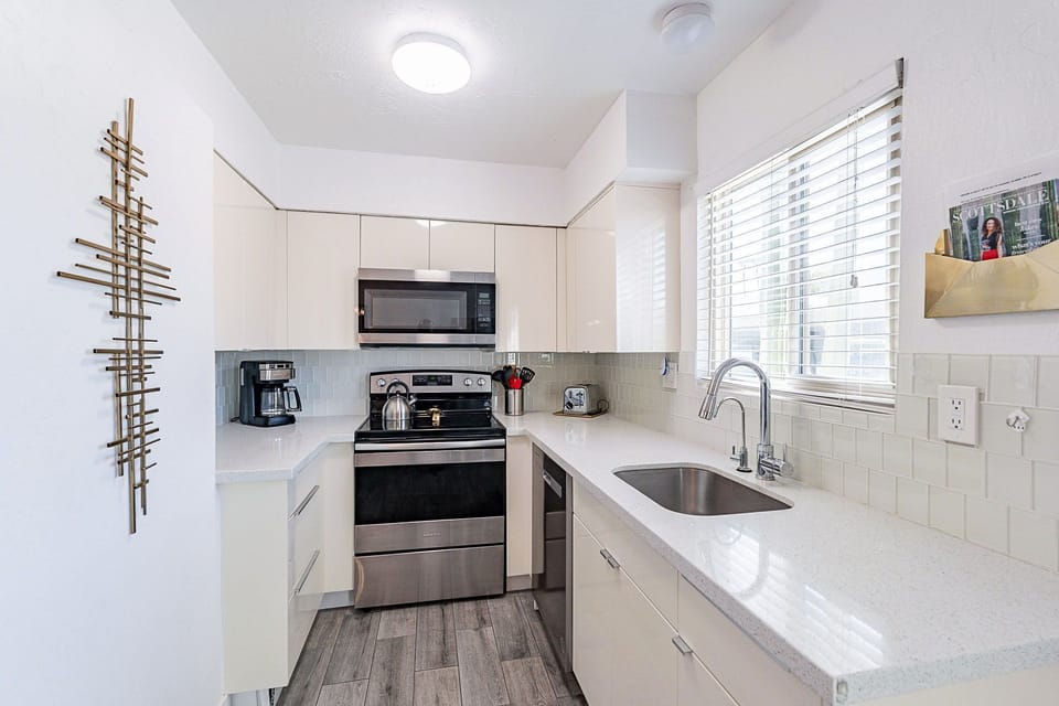 Galley style kitchen complete with the modern conveniences of home