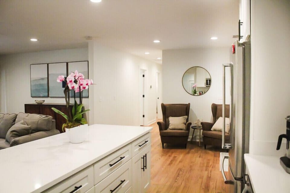 Another view from the kitchen island - comfy chair nook makes it easy to relax 