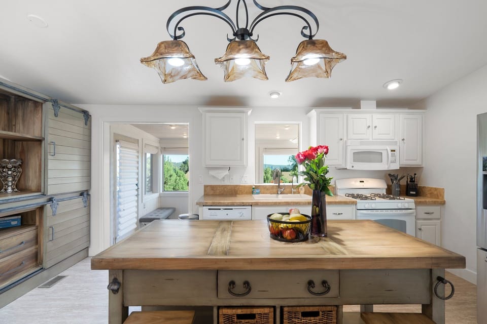 Enjoy the company and the view at the island in the kitchen