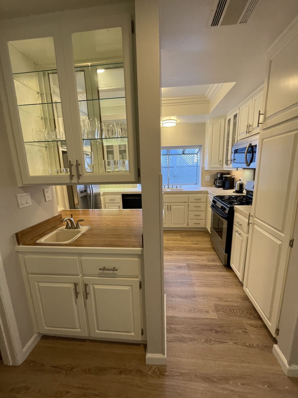 Kitchen entrance showing wet bar counter