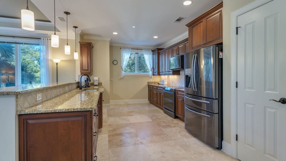 This spacious, well-appointed kitchen is designed for both everyday meals and effortless entertaining.