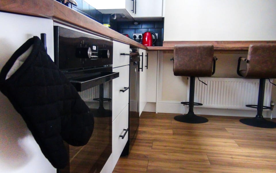 Furnished kitchen to cook your own meals.