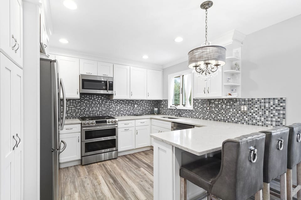 Newly renovated kitchen with chef stove 
and oven
