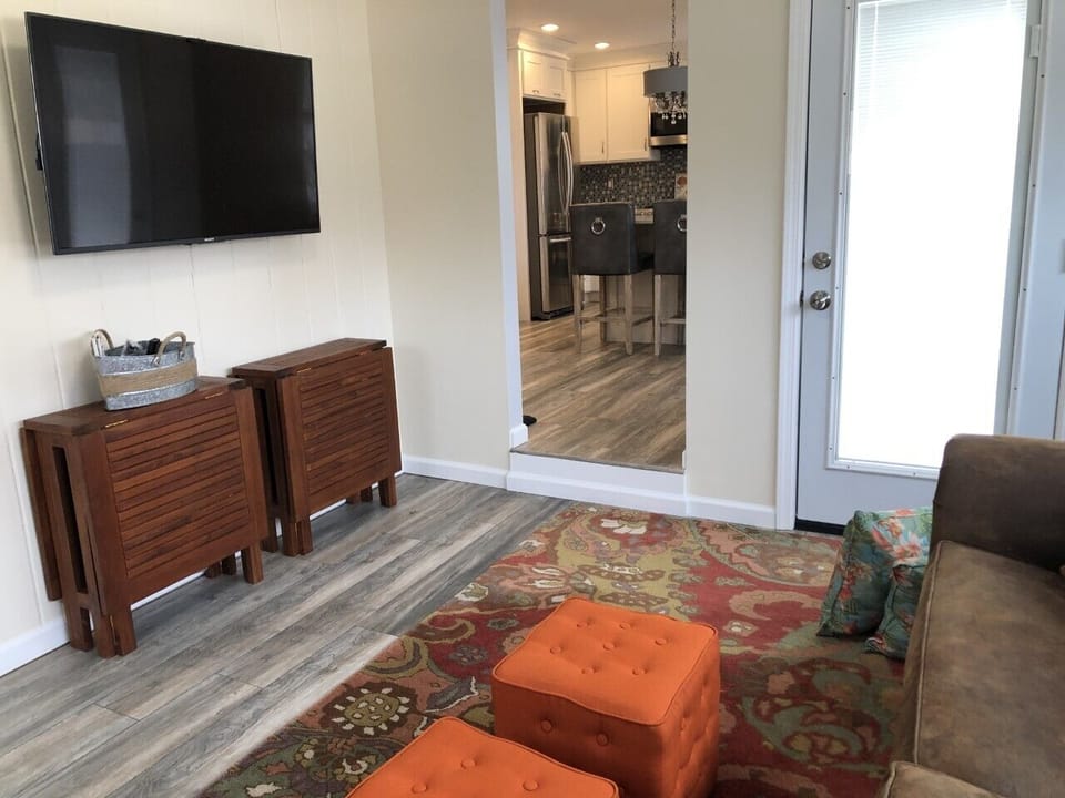 sun room off of kitchen and access to patio, garage and basement