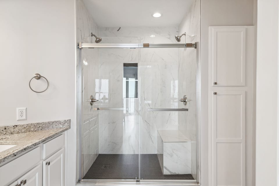 Master shower with bench and two shower heads.  Brand new!