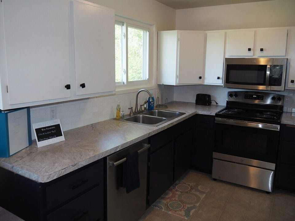 KITCHEN: The home has an updated kitchen with all appliances including a dishwasher and a cute little coffee bar.