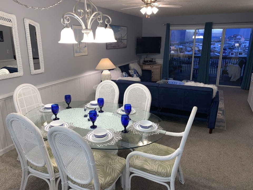 Comfortable dining seats 6 with 4 additional at the kitchen bar - open design.