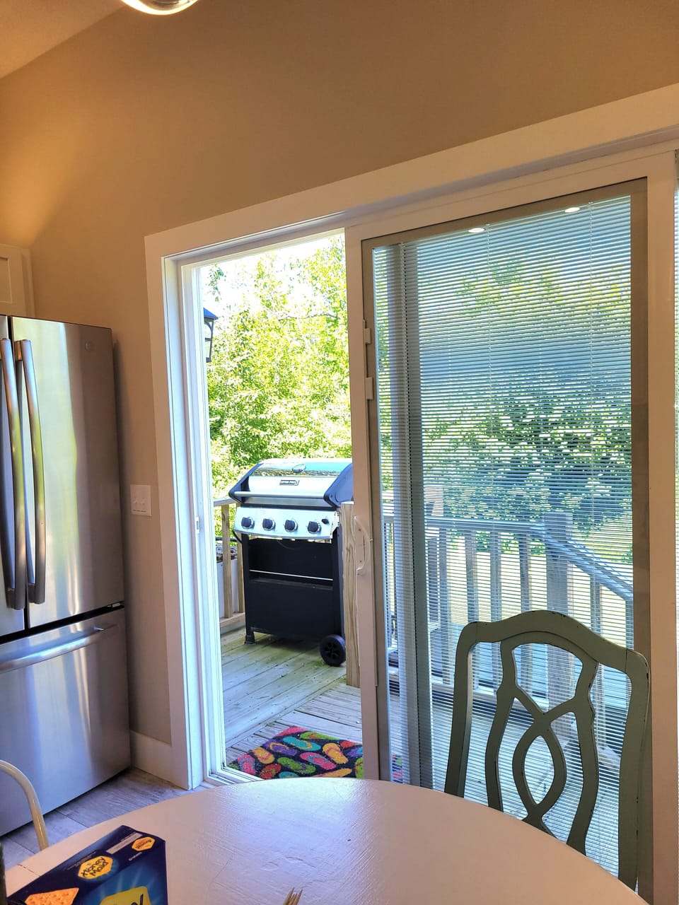 grill on porch beside kitchen. 
