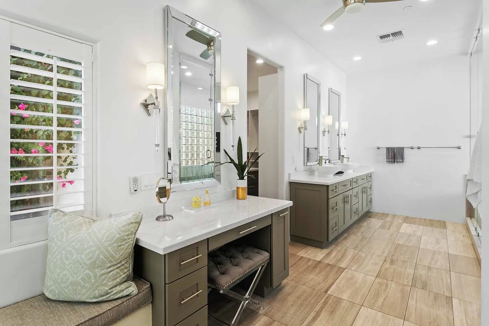 Bedroom 1 - Primary en suite bathroom with double vanities, tub, walk-in shower