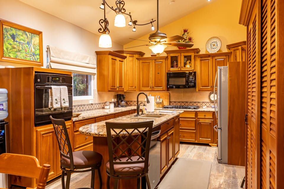 Wall oven, gas cook top, dishwasher, disposal, fridge with ice maker, and more.