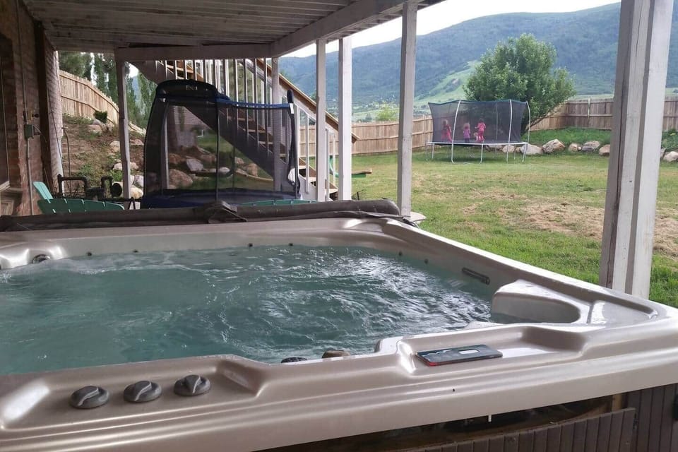 Sit under the stars and admire Ben Lomand Peak from the year-round hot tub just off the downstairs game room.