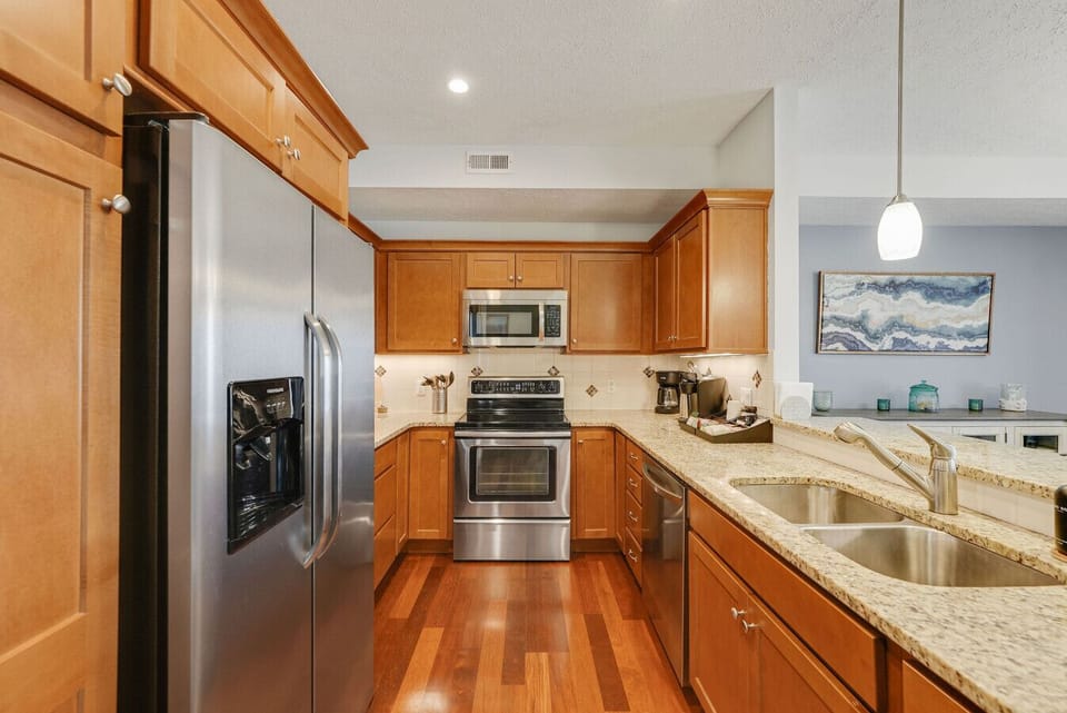 Spacious kitchen with modern appliances and plenty of prep space