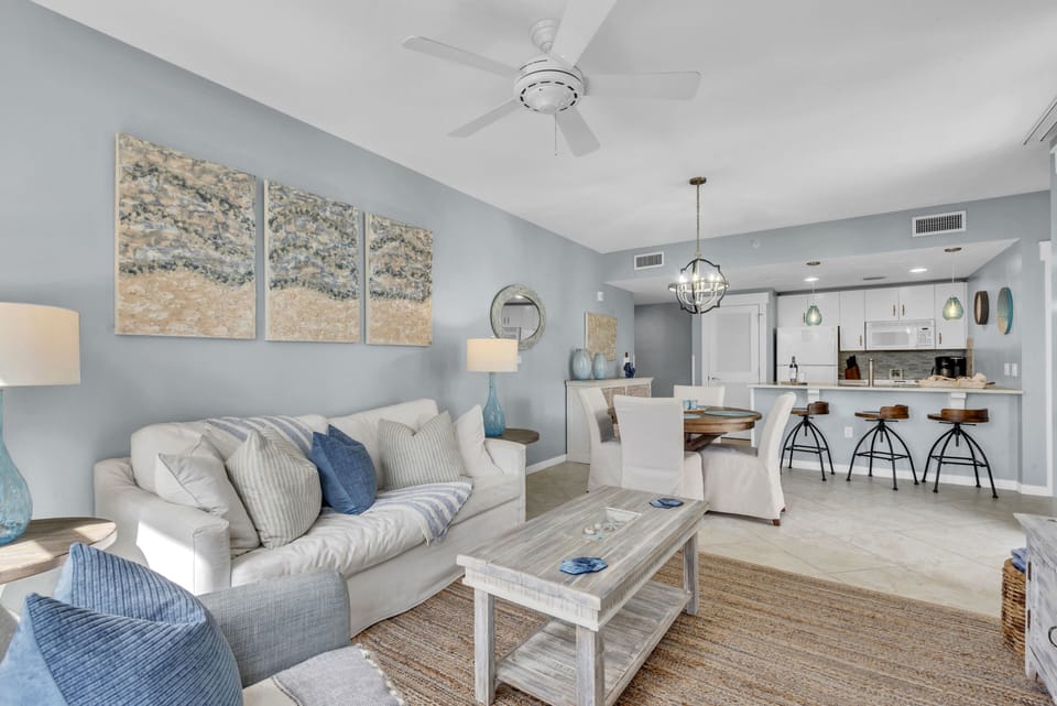 comfy sofa— which is also a pull-out bed— and armchair face a large flatscreen 