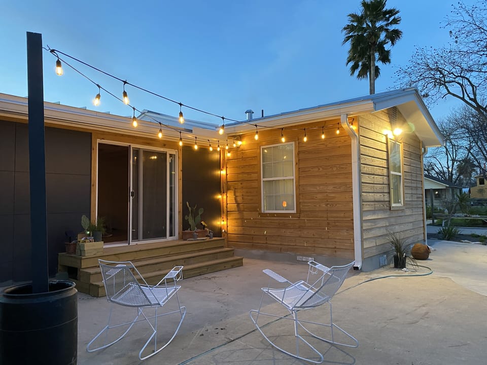 Outdoor sitting patio with lights