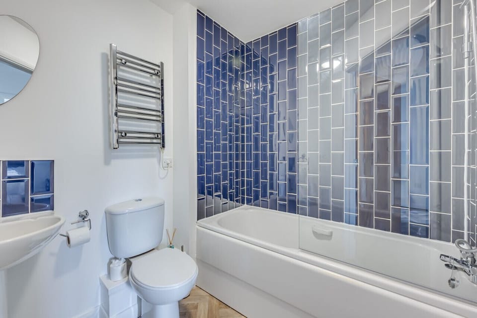The apartment has an additional bathroom with a shower over bath. Complimentary toiletries are provided.