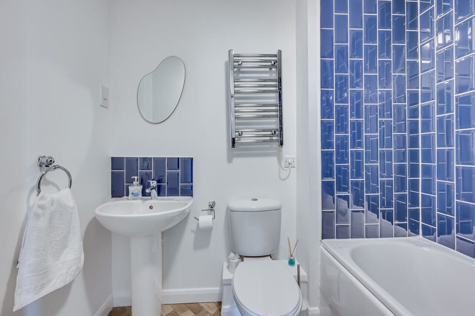 The apartment has an additional bathroom with a shower over bath. Complimentary toiletries are provided.