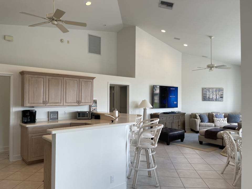 Great room - open concept with soaring ceilings