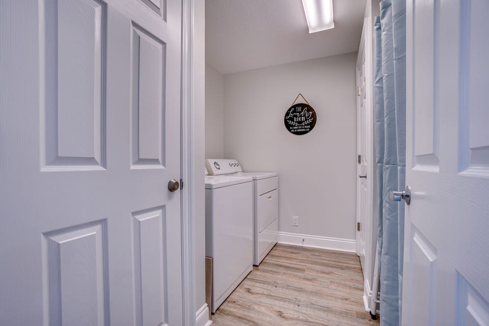 Your dedicated laundry space keeps clothes fresh throughout your stay with full-size washer and dryer tucked away in this convenient alcove.