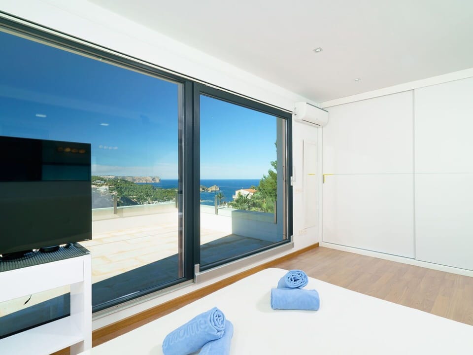 Property, Building, Plant, Furniture, Window, Azure, Shade, House, Architecture, Table