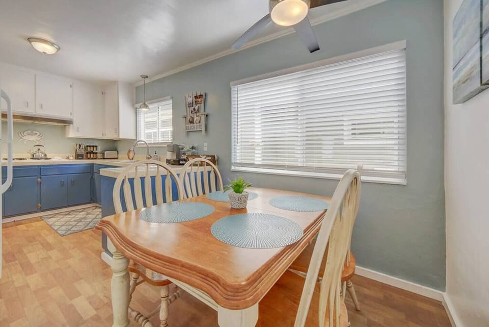 Dining area: Enjoy the space for dining or playing games. Table expands to fit six or more. 