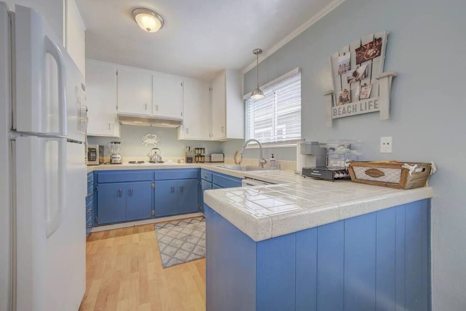 Spacious kitchen with all the supplies needed to cook your favorite meals. Features full size fridge, stove, oven, and coffee machine and plenty of coffee to get you started in the mornings!