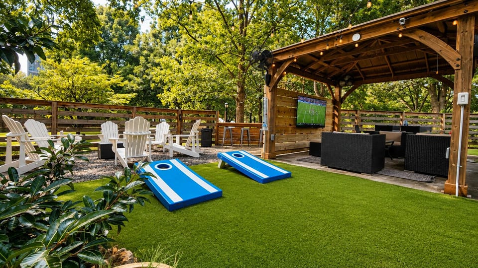 Resort Style Backyard
• Covered gazebo with 65" Smart TV and fans
• Outdoor Bar with Seating for 6 and mini-beverage refrigerator
• Gas grill
• Outdoor dining table with seating for 6
• Multiple lounge areas
• Cornhole, Giant Jenga, and outdoor games