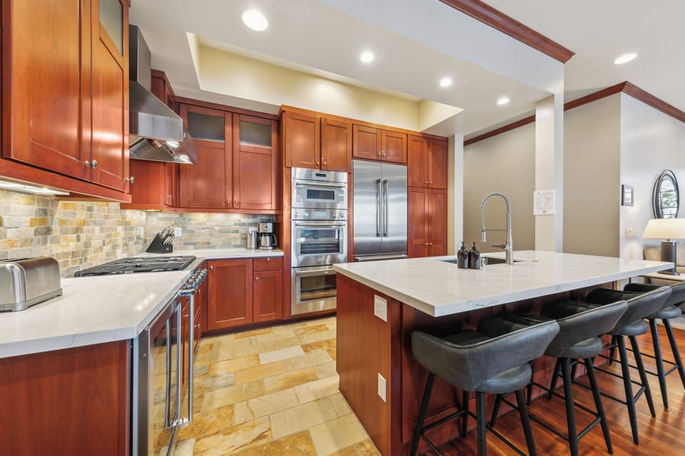 Brand new, state of the art, high end, Thermador Kitchen appliances featuring Stainless Steel convection double wall ovens, built-in microwave, French door cabinet depth refrigerator with bottom freezer, 5 burner cook-top and microwave.