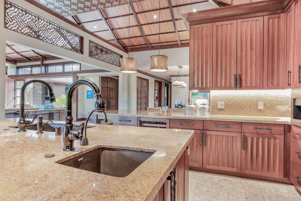 Chef's kitchen with state of the art WOLF appliances and Miele coffee machine