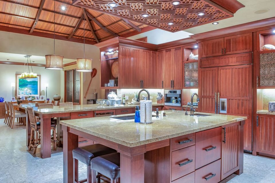 Chef's kitchen with state of the art WOLF appliances and Miele coffee machine