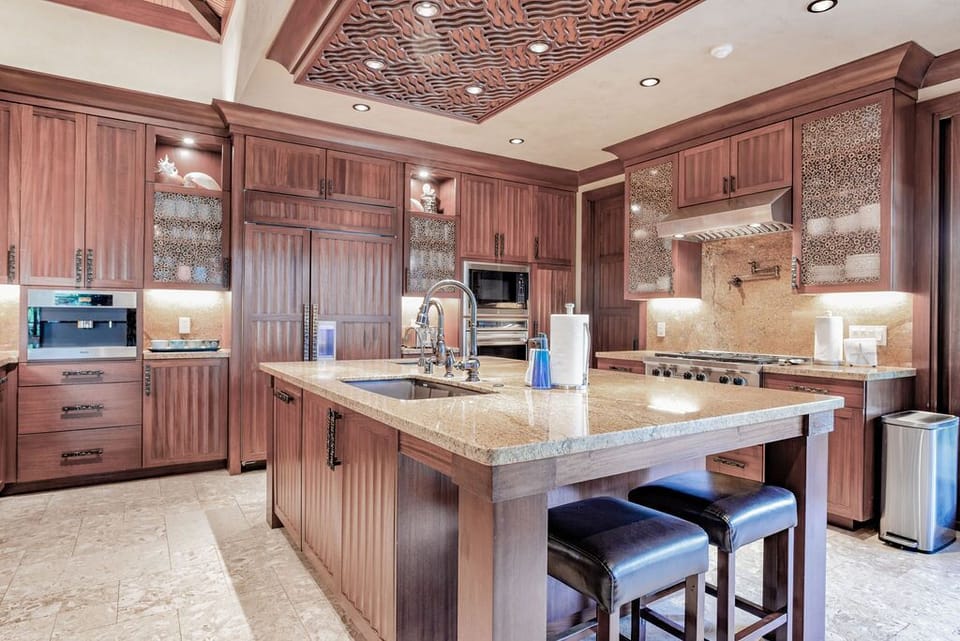 Chef's kitchen with state of the art WOLF appliances and Miele coffee machine