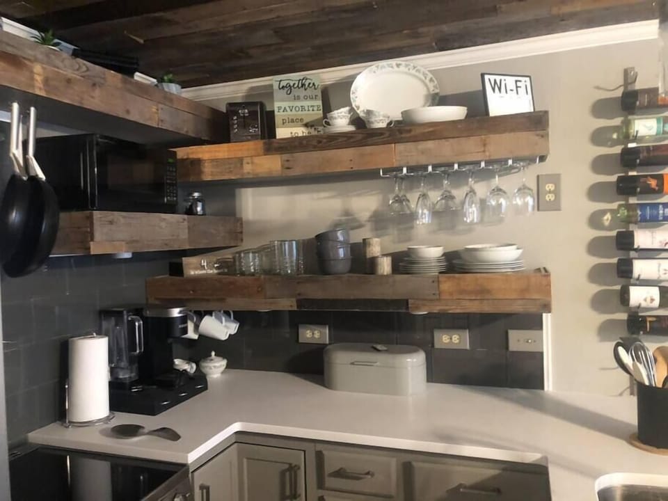 Upper kitchen cabinets/dishware 