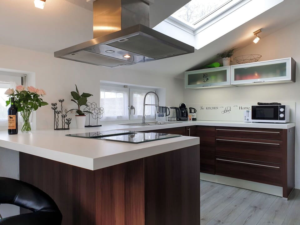 Countertop, Cabinetry, Plant, Property, Furniture, Building, Kitchen, Sink, Houseplant, Interior Design