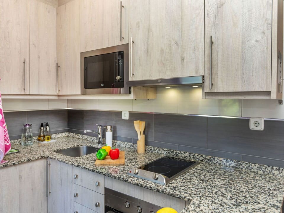 Kitchen, Kitchen Appliance, Countertop, Major Appliance, Cabinetry, Flooring, Interior Design, Home Appliance, Furniture, Kitchen Stove