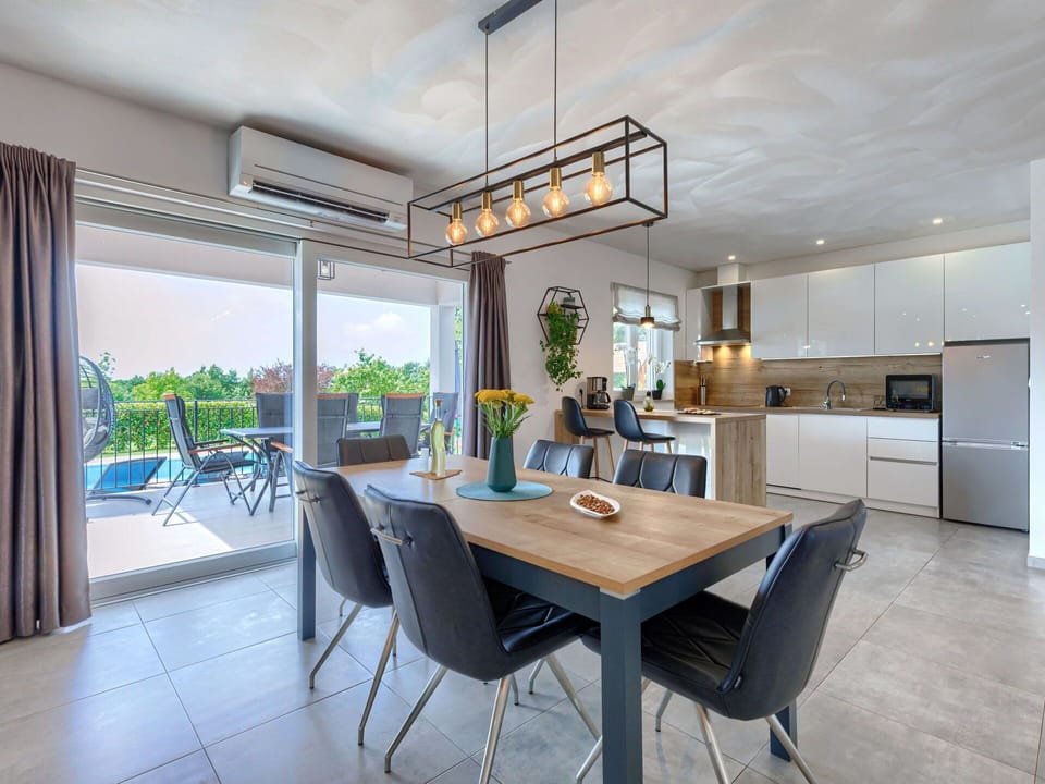 Table, Furniture, Cabinetry, Building, Chair, Countertop, Wood, Interior Design, Couch, Floor