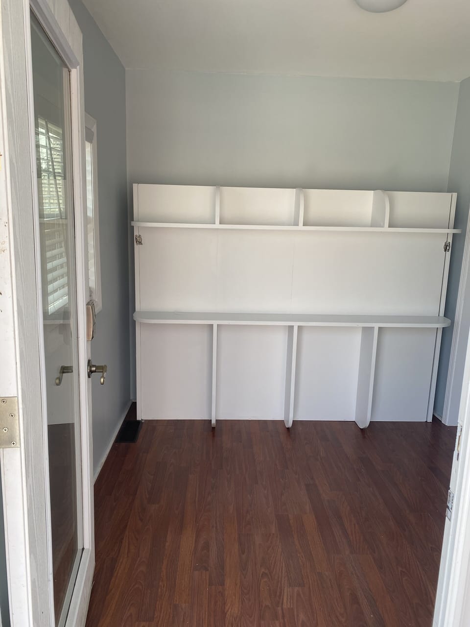 Entryway with queen murphy bed folded up