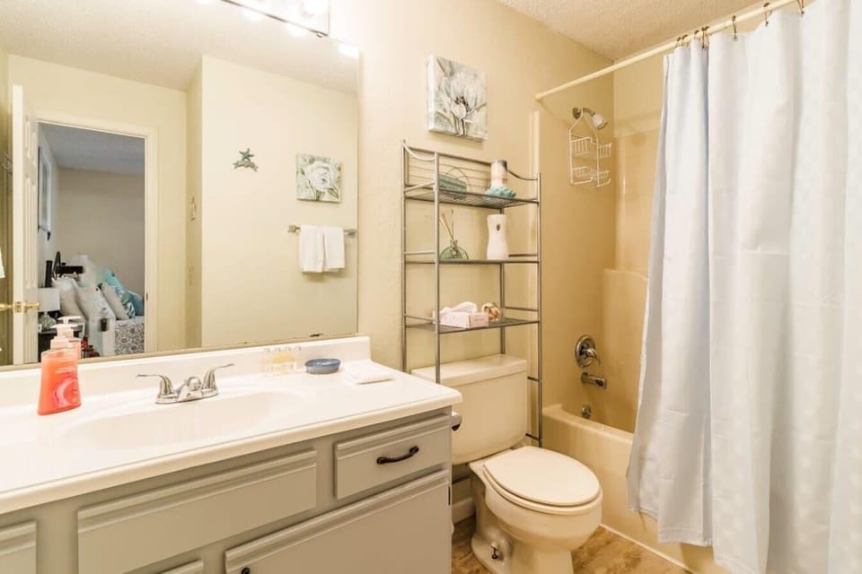 Master Bathroom offers a bright vanity space.