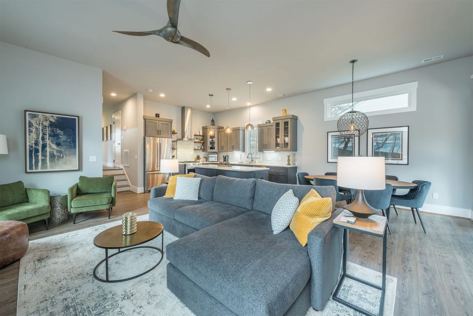 Open living, dining, and kitchen on the main level.