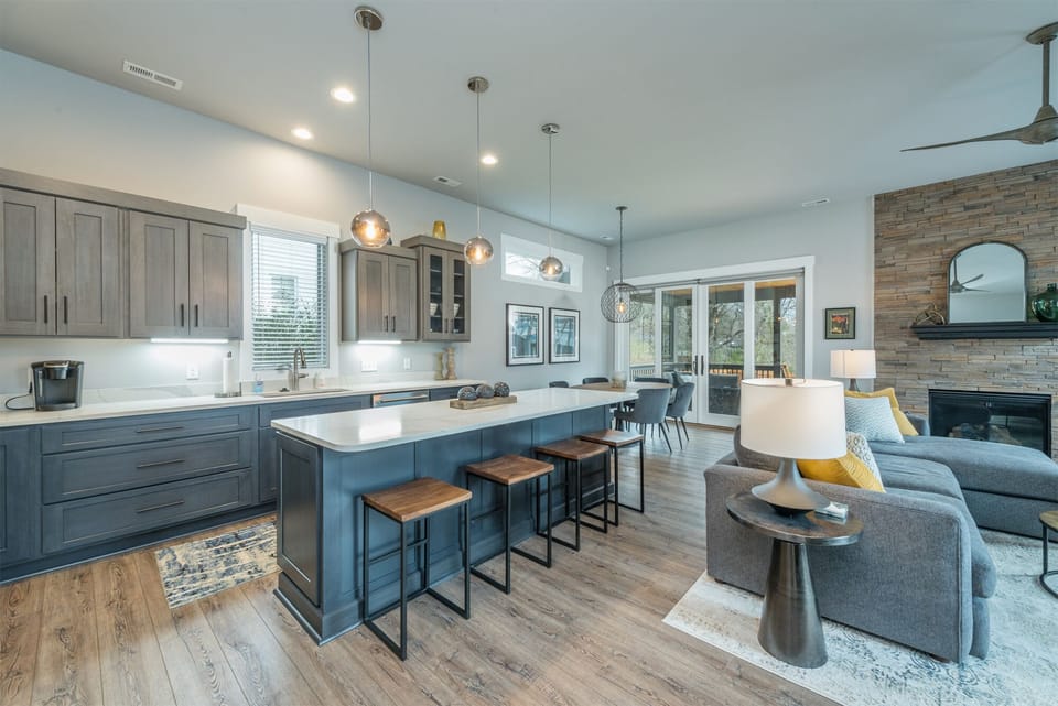 Open living, dining, and kitchen on the main level.