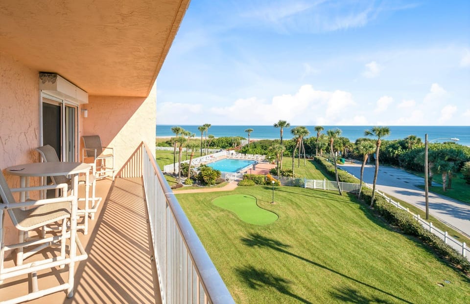 Enjoy ocean breezes from your private balcony with seating