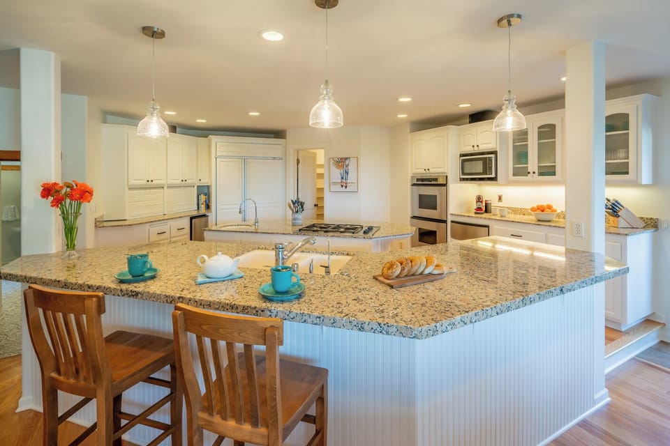 One island has bar seating to enjoy a casual meal or indulge in conversations while whipping up something delicious!