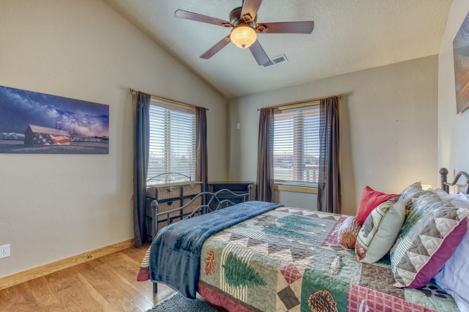 Spacious queen bedroom with electric fireplace/heater