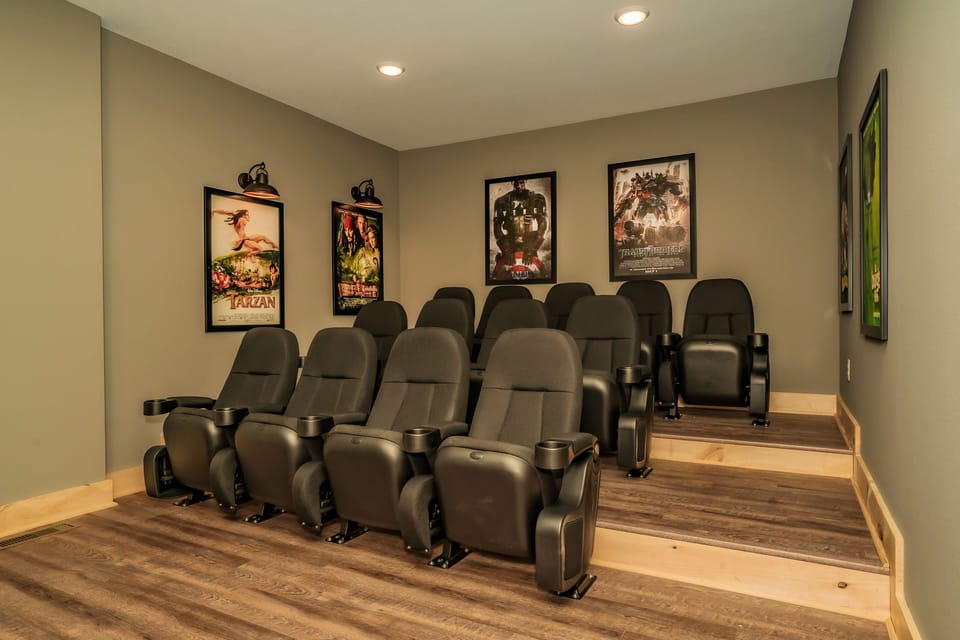 Theater room with seating for 13 and ample space for additional lounging!