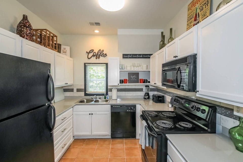 Kitchen is on the smaller side and has not been renovated but is fully stocked with everything you will need.